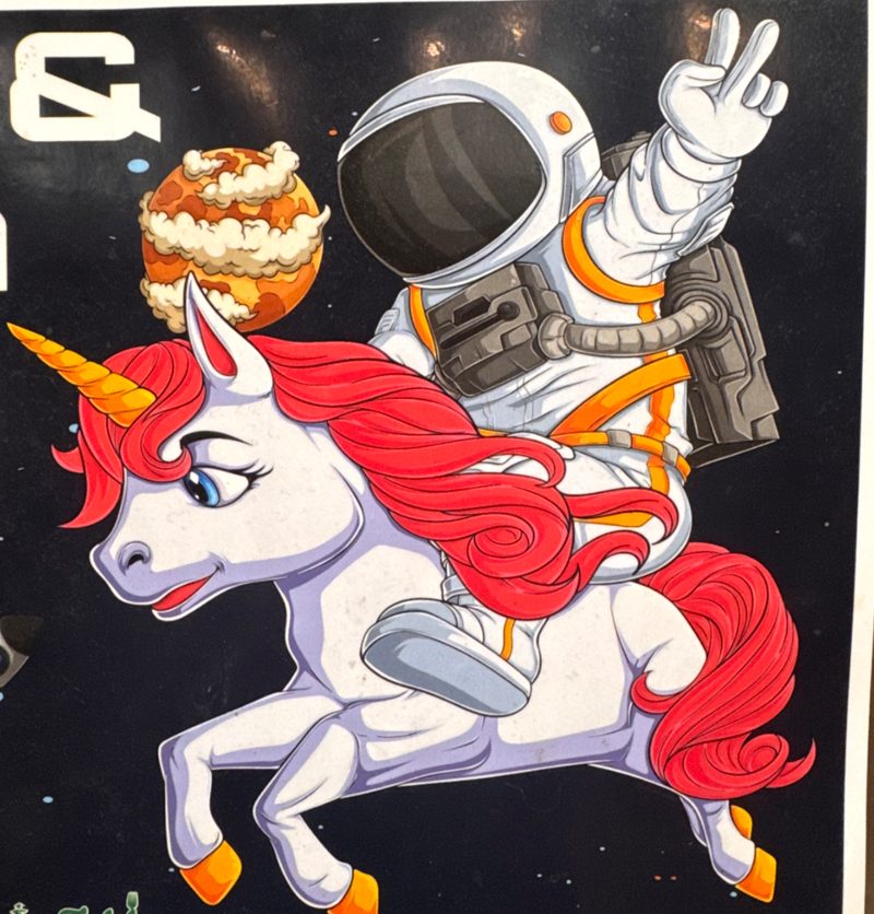The original artwork: a cartoon astronaut riding a red-maned unicorn through space